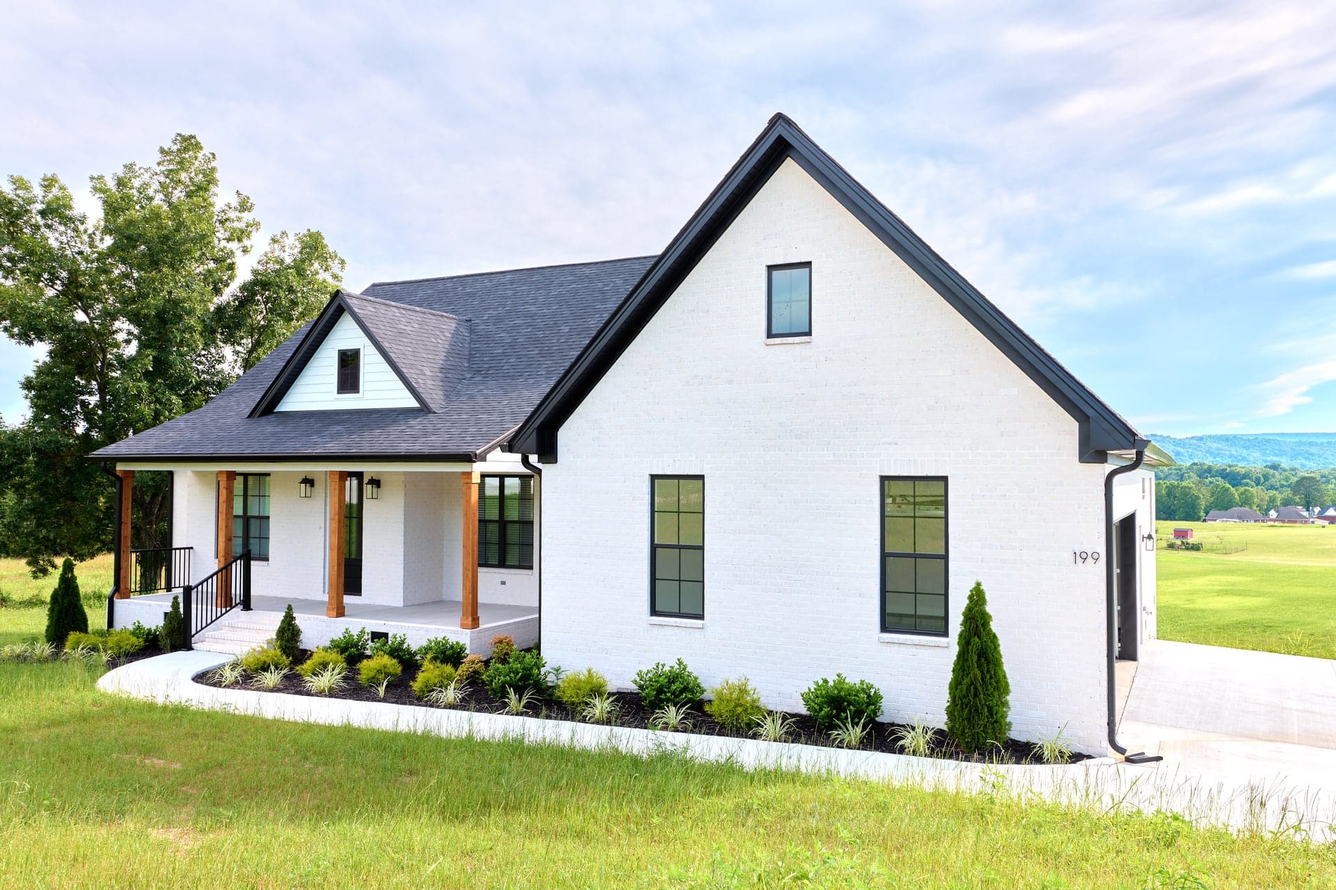 A white home in the sunlit Chattanooga landscape