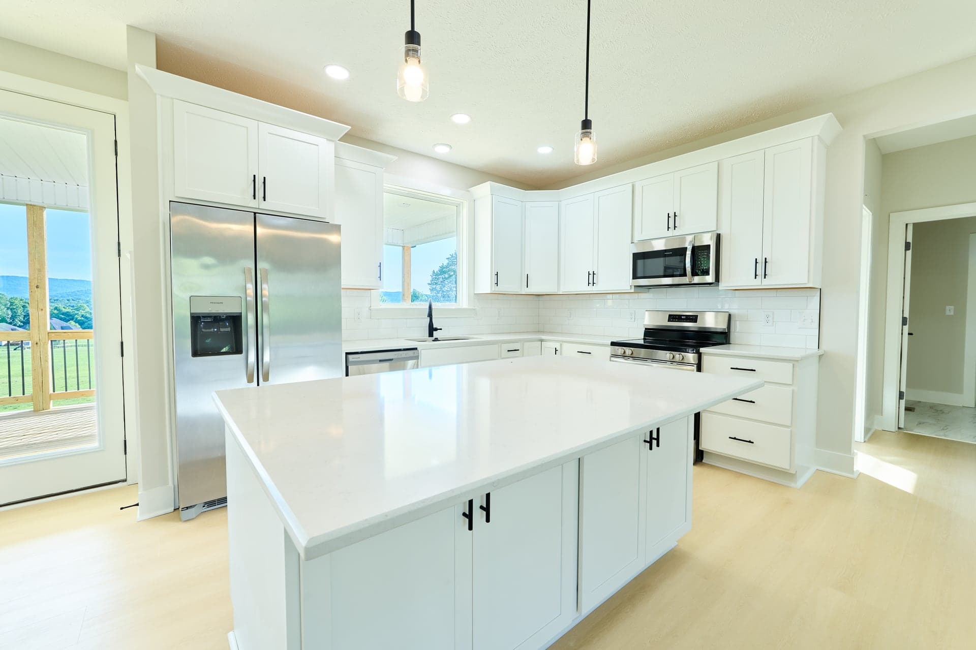 A bright kitchen with warm wood cabinetry