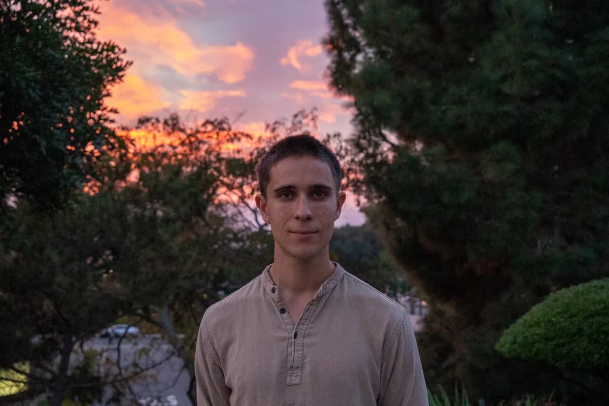 Blaine beneath a colorful sunset